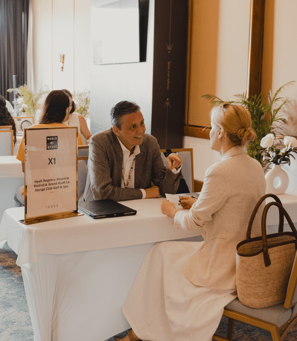 An exhibitor and buyer in a one-to-one meeting at TFest